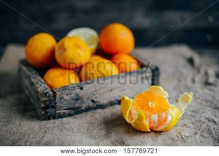Fresh Mandarin Oranges Fruit With Leaves On Wooden Table.  Ripe