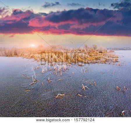 Colorful Sunrise On The Frozen Lake.