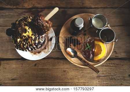 beverage and dessert of summer - blended coffee brew cold chocolate ice cream on table in cafe. vintage color tone