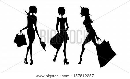 Shopping sillhouettes set. Black sillhouettes of women with shopping bags on white background. Elegant, young and slim women.
