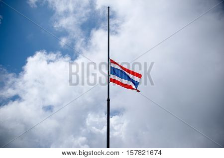 Thailand flag half-mast on pole to mourn