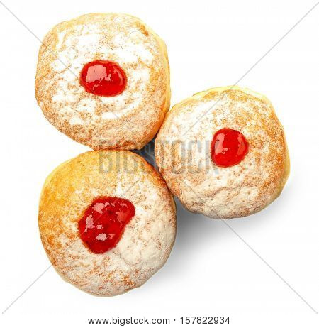 Tasty donuts with jam on white background. Hanukkah celebration concept