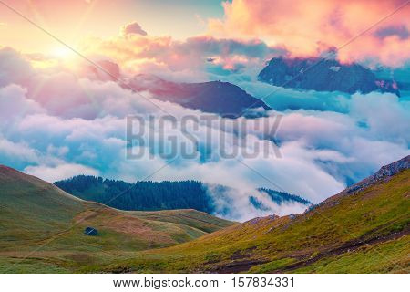 Colorful Summer Sunrise In The Foggy Val Di Fassa Valley