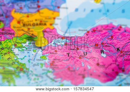 Troy Truva historical town in Turkey pinned on colorful political map of Europe. Geopolitical school atlas. Tilt shift effect.