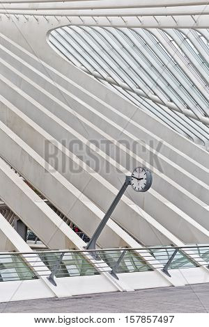 LIEGE BELGIUM - December 2014: Abstract view on the roof with station clock of the Liege-Guillemins railway station designed by Santiago Calatrava.