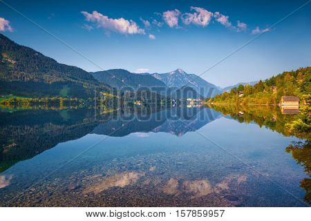 Deep Blue Sky Reflected In The Mirror Of Water Surface