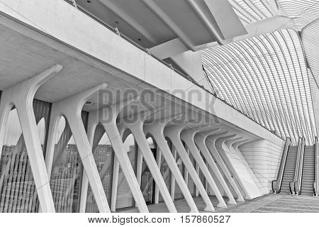 LIEGE BELGIUM - December 2014: View on escalators in the Liege-Guillemins railway station designed by Santiago Calatrava. Black and white photograph