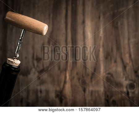 Cork Screw And Wine Bottleopening A Wine Bottle With A Corkscrew In A Restaurant