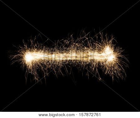 Dash, hyphen or minus sign. Sparkler firework light alphabet punctuation mark, text symbol on black background. Font pattern.