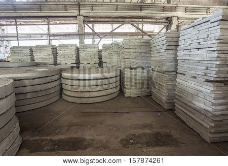 Stack of precast reinforced concrete slabs in a house-building factory