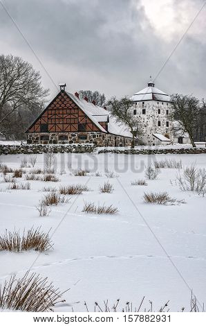 View of a snow covered Hovdala Castle in Hassleholm region. Hovdala Castle is a castle in Hassleholm Municipality Scania in southern Sweden.