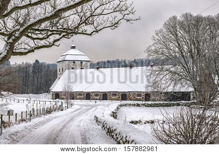 View of a snow covered Hovdala Castle in Hassleholm region. Hovdala Castle is a castle in Hassleholm Municipality Scania in southern Sweden.
