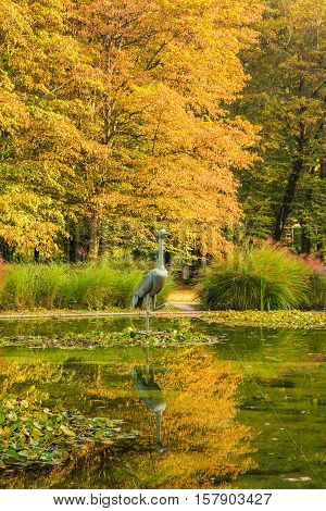The crane bird statue in beautiful public park in Daruvar, Croatia, in autumn