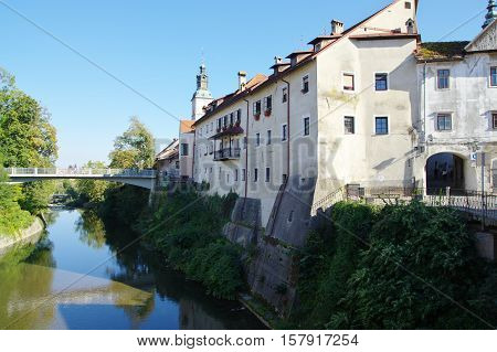 Gmina Škofja Loka, Škofja Loka Slovenia - September 25 2016: Selska Sora river. On the right is the entrance to the old town.