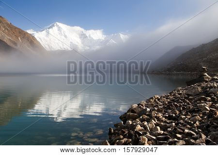 View of mount Cho Oyu mirroring in Gokyo lake or Dudh Pokhari three passes trek and Cho Oyu base camp trek Sagarmatha national park Khumbu valley Nepal