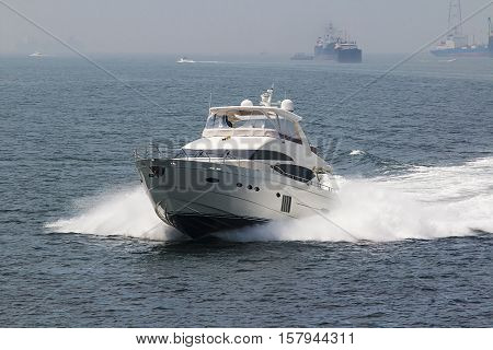motor yacht fast sailing on the sea in the roadstead of Vladivostok Russia