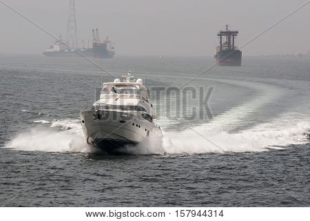 motor yacht fast sailing on the sea in the roadstead of Vladivostok Russia