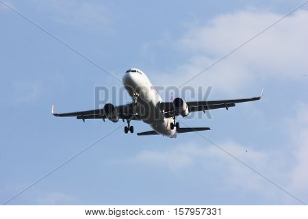 CHIANGMAI , THAILAND- FEBRUARY 19 2014 : HS-TXJ Airbus A320-200 with winglet of Thaismile airway. Landing to Chiangmai airport from Bangkok Suvarnabhumi.