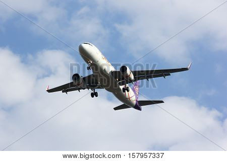 CHIANGMAI , THAILAND- FEBRUARY 19 2014 : HS-TXJ Airbus A320-200 with winglet of Thaismile airway. Landing to Chiangmai airport from Bangkok Suvarnabhumi.