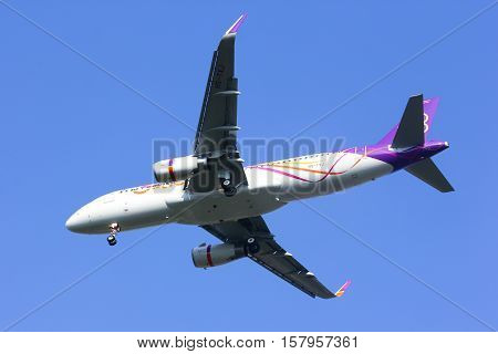 CHIANGMAI , THAILAND- FEBRUARY 19 2014 : HS-TXJ Airbus A320-200 with winglet of Thaismile airway. Landing to Chiangmai airport from Bangkok Suvarnabhumi.