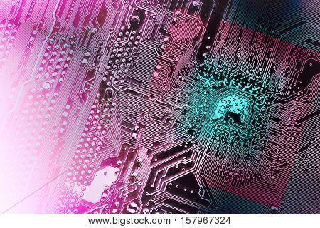 Closeup Of Computer Micro Circuit Board, Toned In Green And Violet