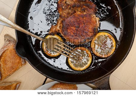 Pork Chop Seared On Iron Skillet