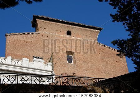 Ara Coeli Basilica (Saint Mary of the Altar of Heaven) characteristic medieval brick facade at the top of Capitol Hill in Rome