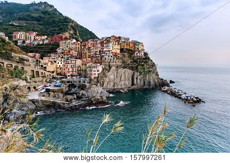 Sunset over Manarola. Small coastal village in the Italian region of Liguria Cinque Terre. Province of La Spezia. UNESCO World Heritage List. Italy
