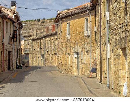 Elderly Lady Across Bar Casa Manolo On Calle Real - Hornillos Del Camino, Castile And Leon, Spain, 1