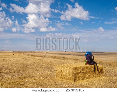 Backpack On A Haystack In The Meseta -  Hornillos Del Camino, Castile And Leon, Spain