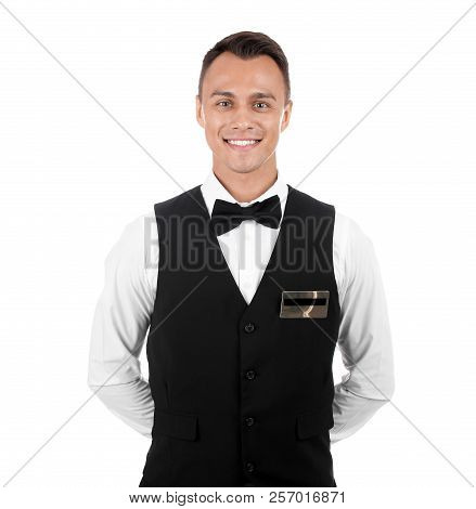 Portrait Of Young Waiter In Uniform On White Background