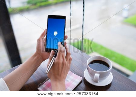 Chiang Mai, Thailand - August 18,2018: Woman Hands Holding Huawei With Paypal Apps On The Screen. Pa