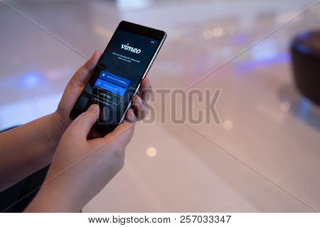 Chiang Mai, Thailand - August 03,2018: Woman Hands Holding Huawei With Vimeo On Screen.  Vimeo Is A
