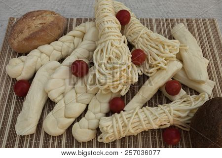 Set Suluguni Cheese. Homemade Suluguni Cheese. Cheese With Homemade Bread And Cherry Tomatoes.