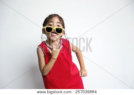Asian Kid With Sport Shirt And Sun Glasses Fashion
