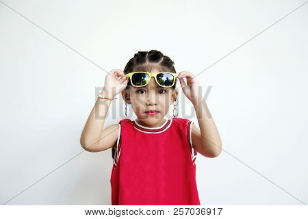 Asian Kid With Sport Shirt And Sun Glasses Fashion
