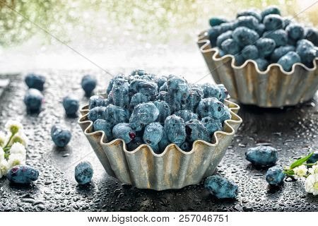 Summer Honeysuckle Berries In Metal Forms For Baking