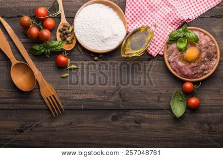 Food Background For Tasty Italian Dishes With Tomato. Various Cooking Ingredients With Spaghetti And