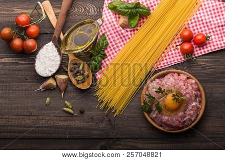 Food Background For Tasty Italian Dishes With Tomato. Various Cooking Ingredients With Spaghetti And