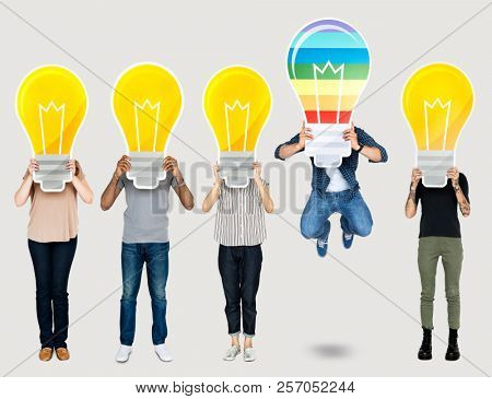 Diverse people holding light bubl icons