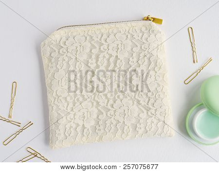 Glamour Guipure Pouch With Golden Zipper On White