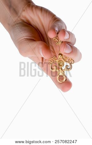 Hand Holding An Isolated Paper House With A White Background