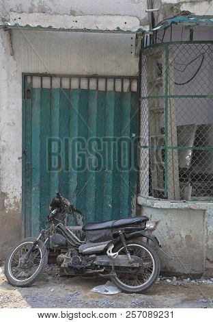 A Doorway In A Small Residential Back Street In The Tran Hung Alleys Area Of District 1 In Saigon.