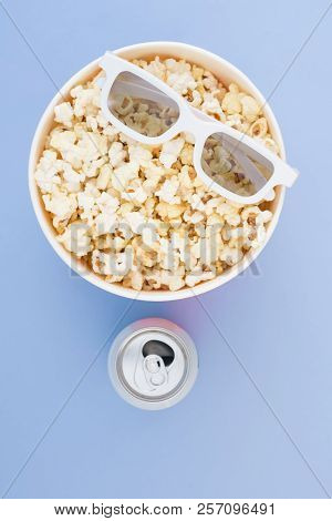 3d Glasses, A Paper Cup Of Popcorn And A Drink In A Metal Jar Are Isolated On A Pastel Blue Backgrou