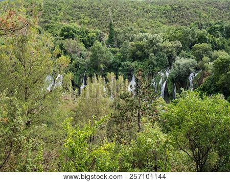 Beautiful Kravica Waterfall In Bosnia And Herzegovina - Popular Swimming And Picnic Area For Tourist
