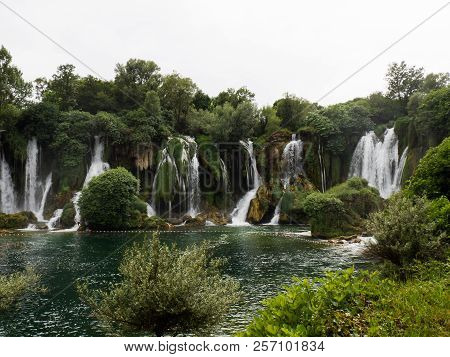 Beautiful Kravica Waterfall In Bosnia And Herzegovina - Popular Swimming And Picnic Area For Tourist