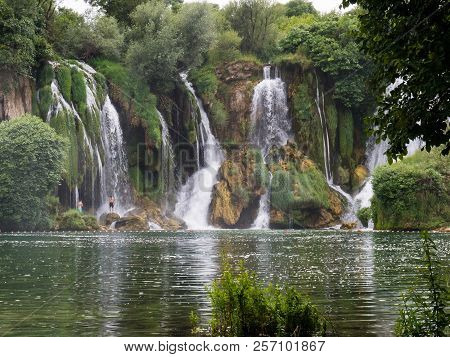 Beautiful Kravica Waterfall In Bosnia And Herzegovina - Popular Swimming And Picnic Area For Tourist