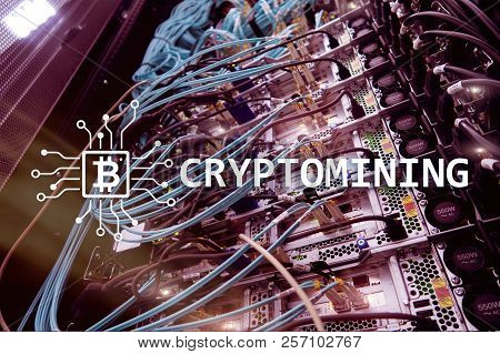 Cryptocurrency Mining Concept On Server Room Background.