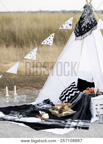 Stylish Black And White Picnic On The Shore Of  Northern Sea. Classic Monochrome Plaid, Flag, Tipi, 