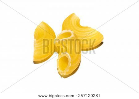 Yellow Pasta Horns On A White Background